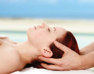 Massage for Concussion Recovery: A Therapeutic Approach A woman is getting a massage for