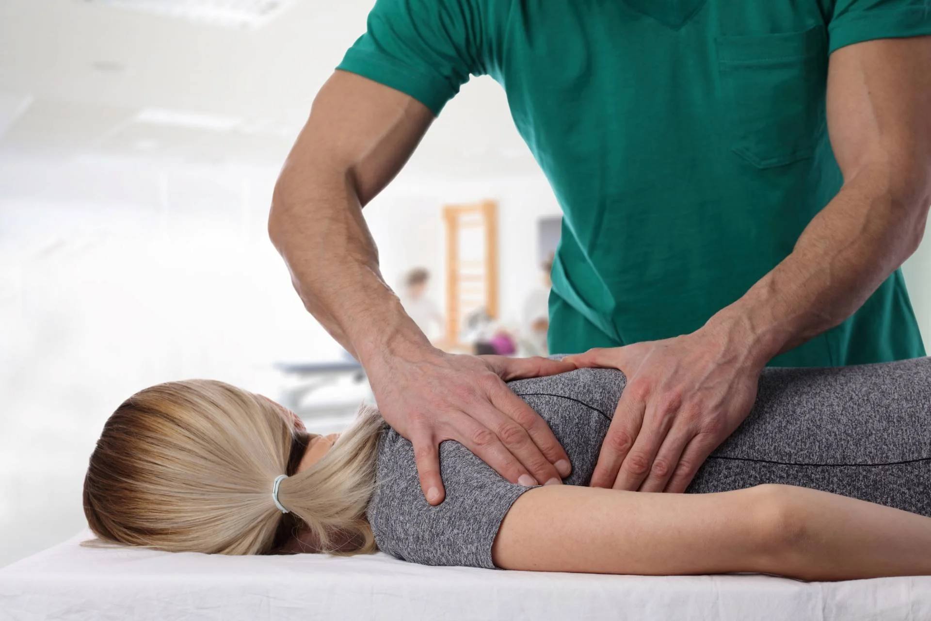 Chiropractic Massage Explained Chiropractic Massage Explained - Womanhavingchiropracticbackadjustment 1